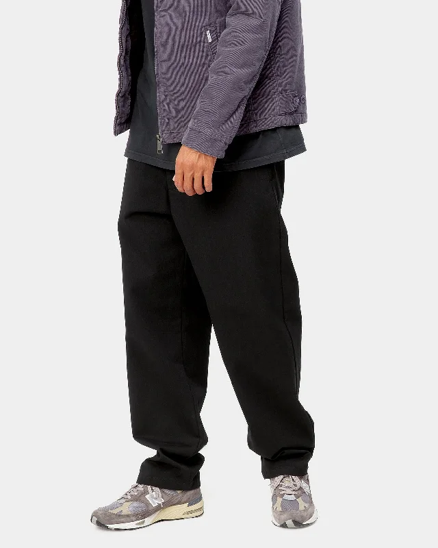 carhartt-wip-calder-pant-relaxed-tapered-mens-trousers-black-rinsed