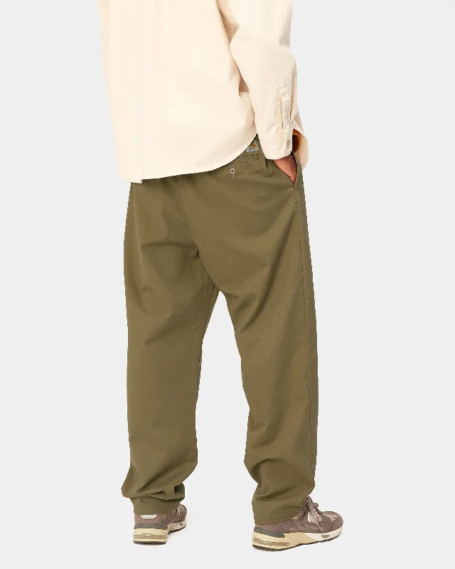 carhartt-wip-calder-pant-relaxed-tapered-mens-trousers-larch-rinsed