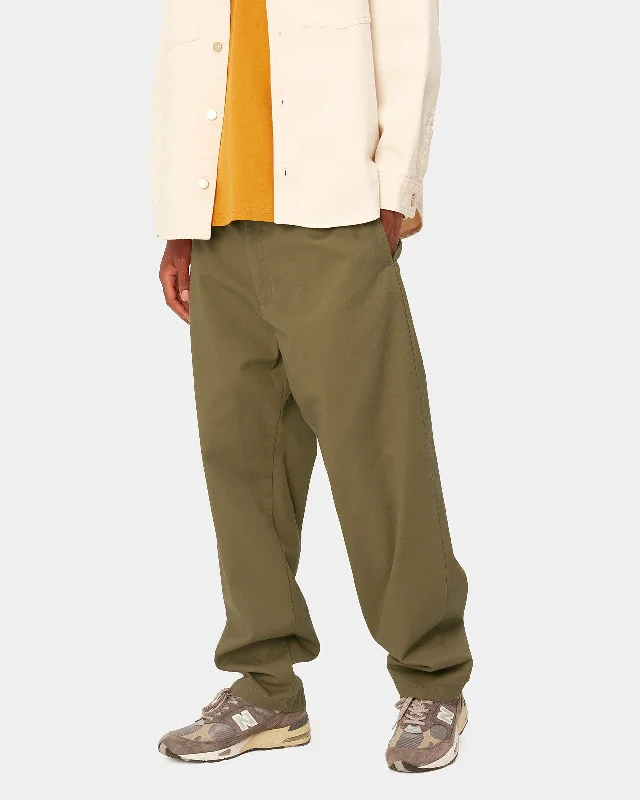 carhartt-wip-calder-pant-relaxed-tapered-mens-trousers-larch-rinsed