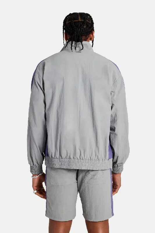 cernucci-panelled-nylon-track-jacket-charcoal